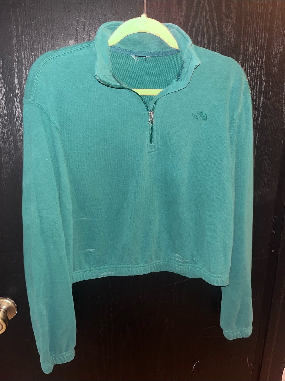 The North Face Women's green Quarter-Zip Pullover tag cut out